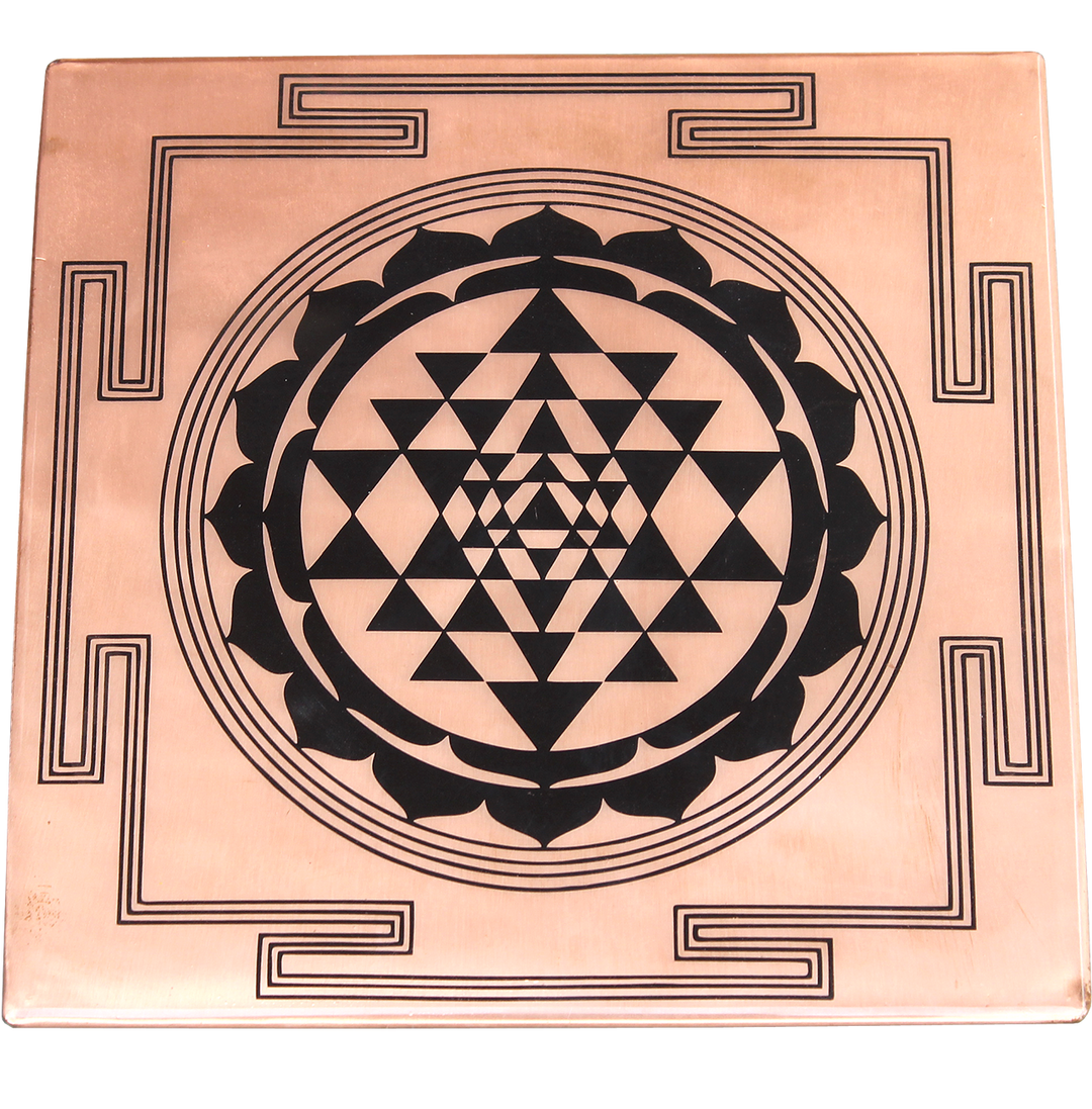 Square copper crystal grid engraved with a Sri Yantra design, painted black.