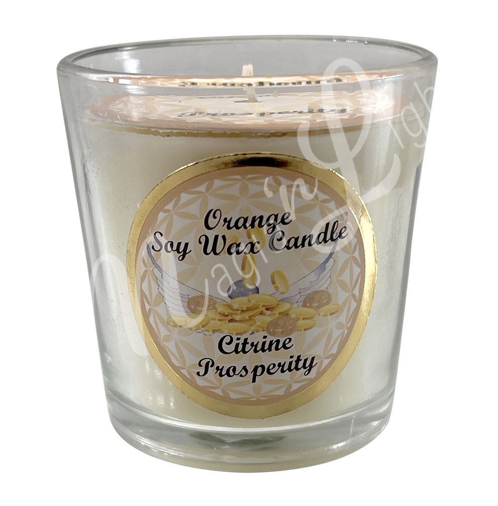 White soy wax candle in a glass holder, labeled "Orange Soy Wax Candle – Citrine, Prosperity.