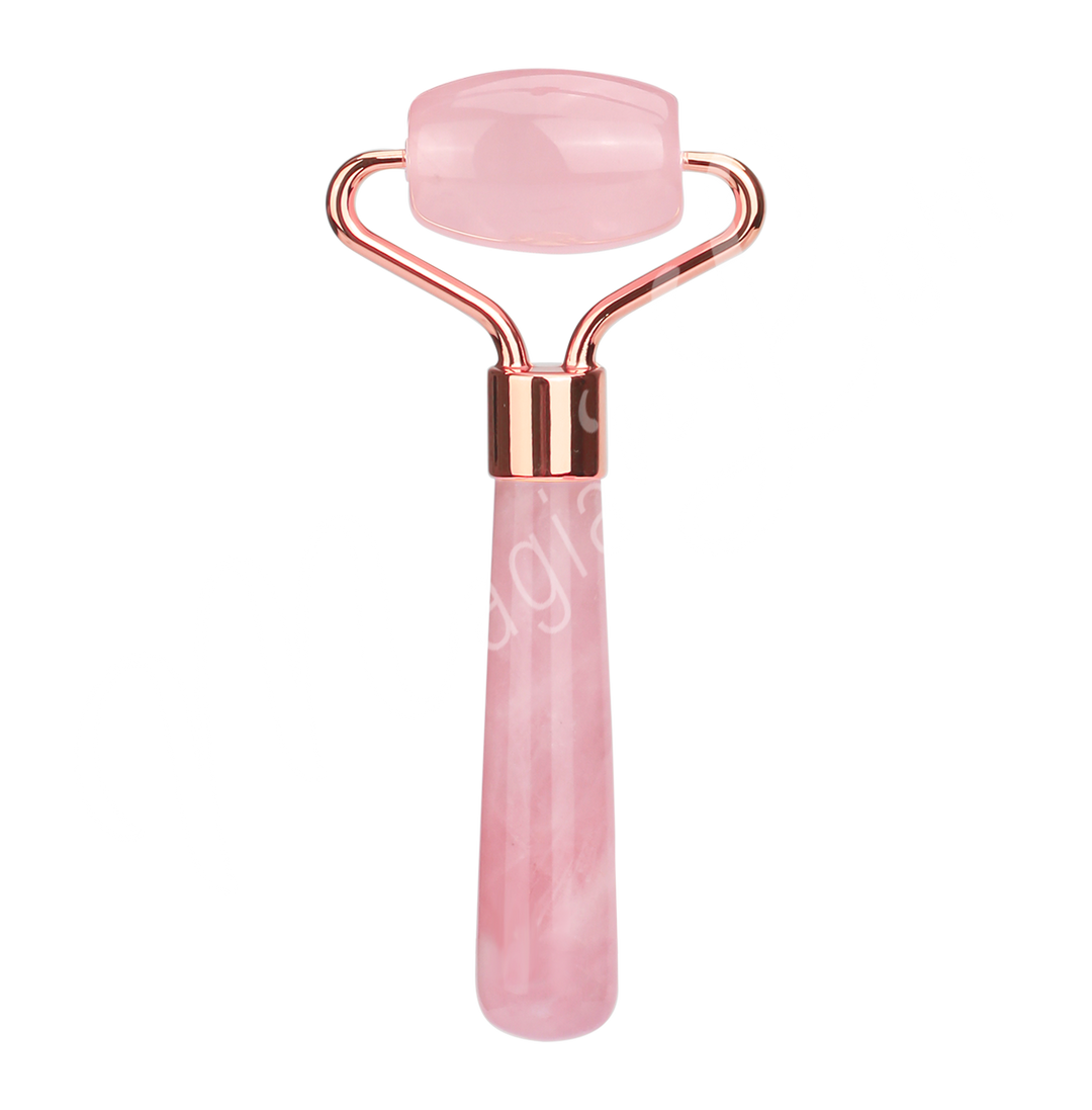 Rose quartz facial roller with a rose-gold frame and a rounded handle for targeted facial massage.