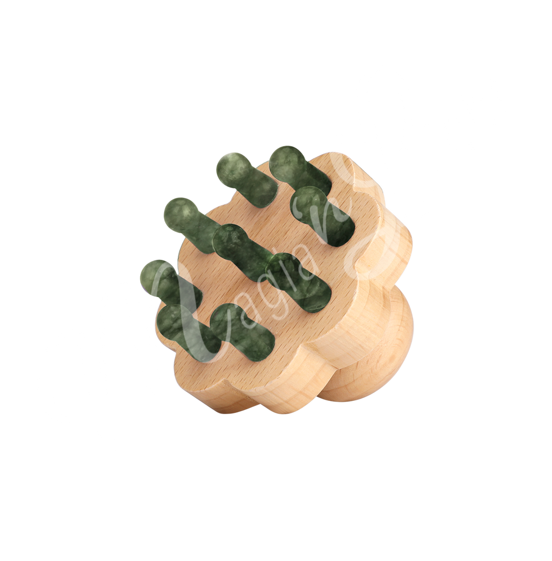 Wooden handheld massager with multiple rounded jade knobs used for muscle relaxation and stimulation.