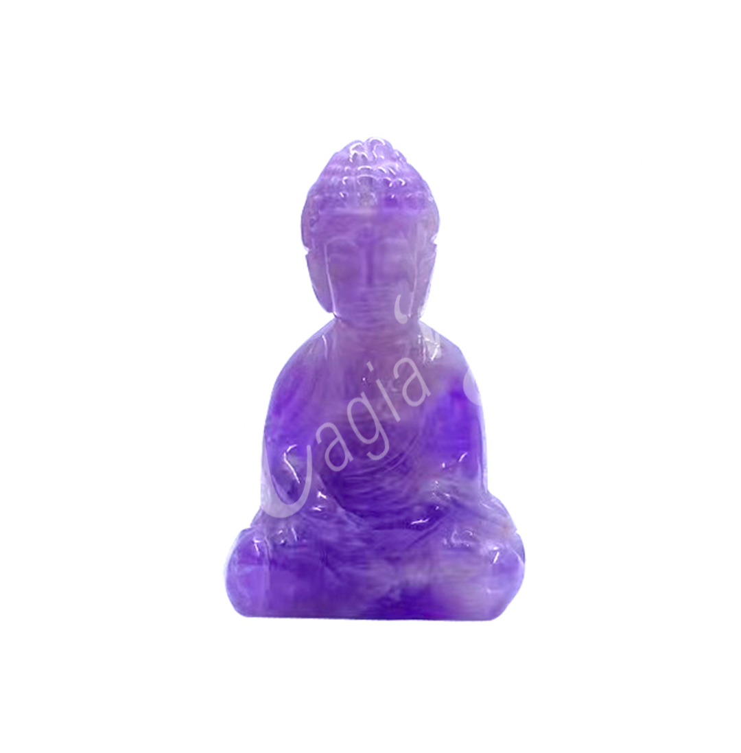 A carving of a Buddha made of Amethyst.