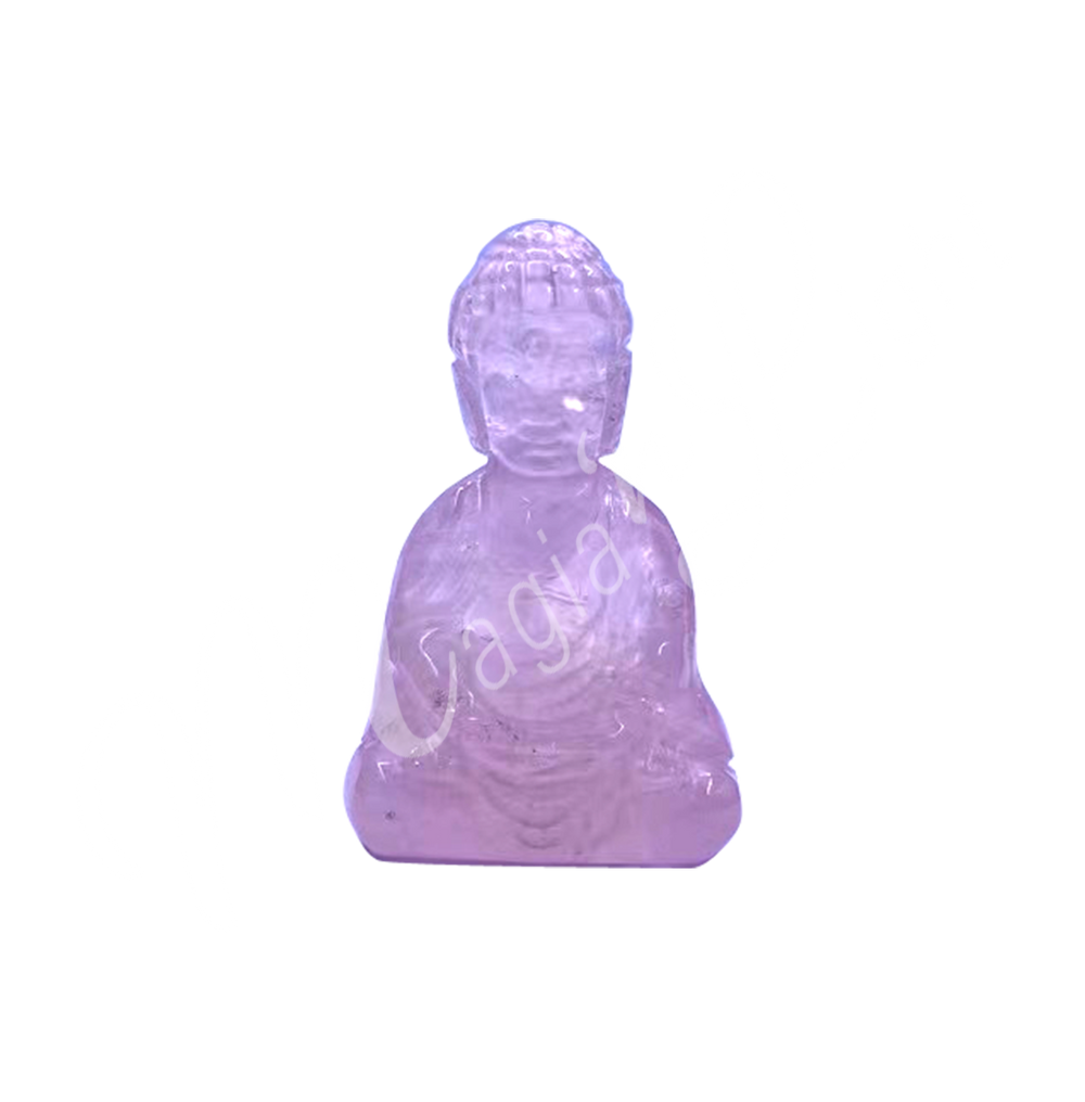 A carving of a Buddha made of Rose Quartz.