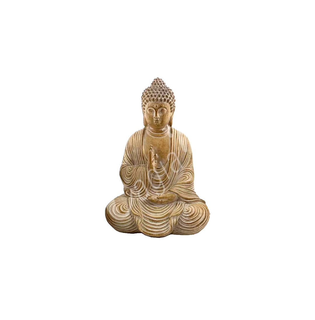 A resin statue featuring the Buddha seated.