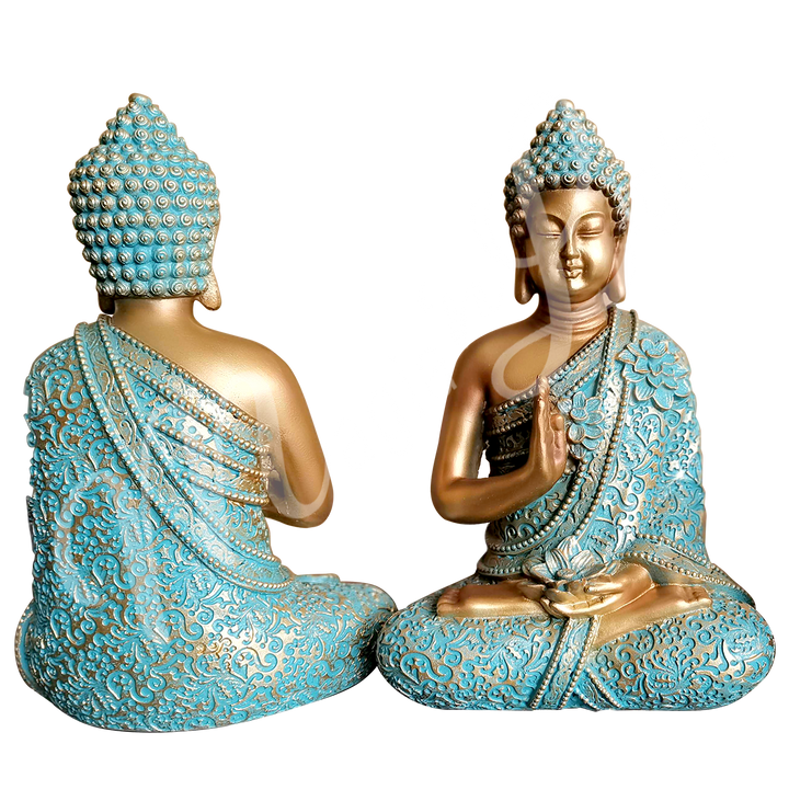 A gold and verdigris-colored resin statue featuring a seated Buddha in prayer, holding a lotus flower, shown back and front.