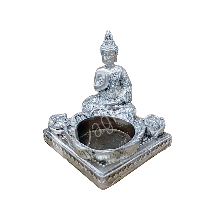 A silver-colored tealight and incense holder made of resin, featuring a Buddha with tealight and incense spaces at the front.