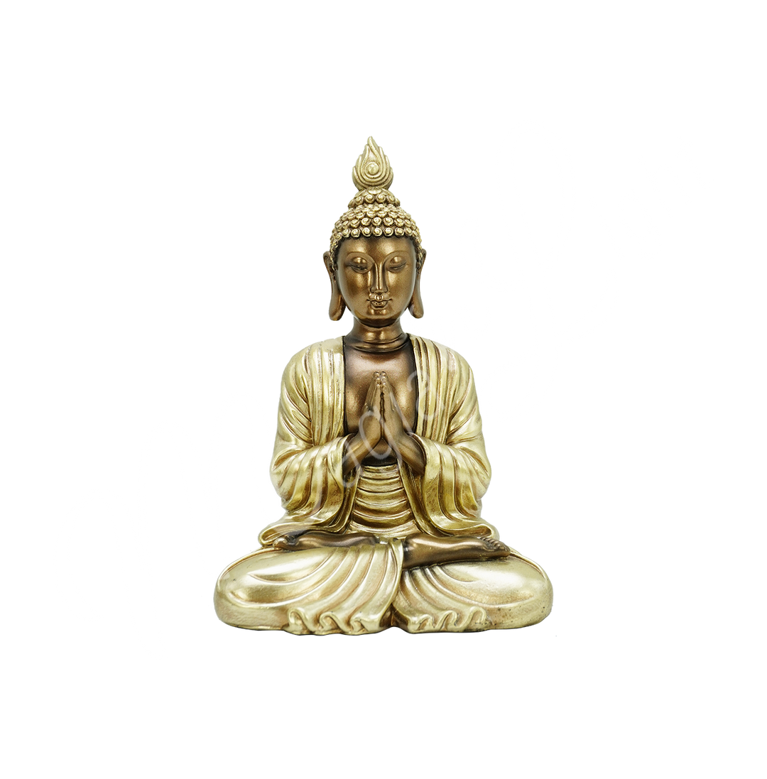 A gold-colored resin statue featuring a seated Buddha in prayer.