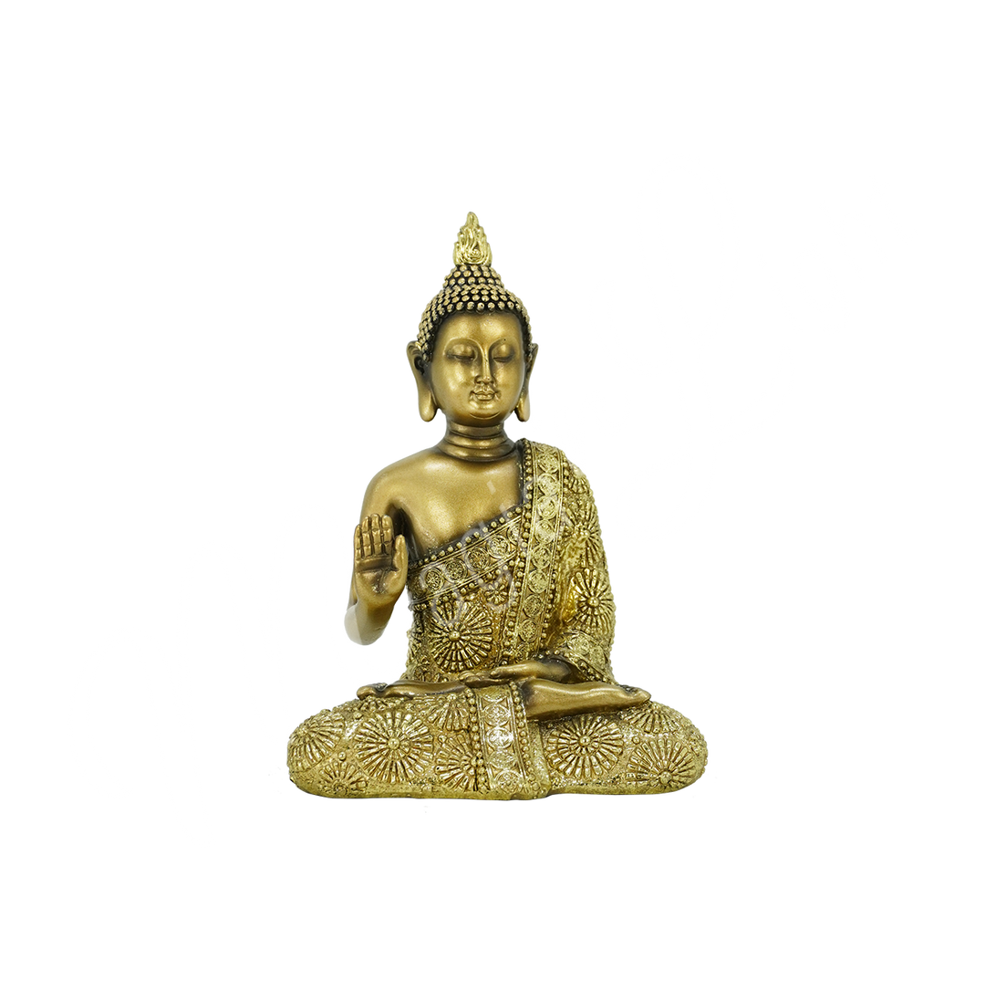An antique gold-colored resin statue featuring a seated Buddha with a raised hand.