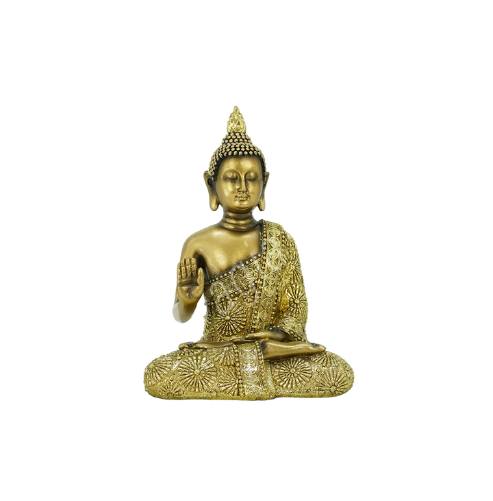 An antique gold-colored resin statue featuring a seated Buddha with a raised hand.