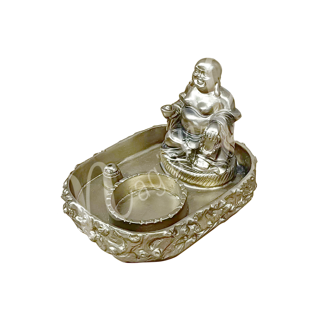 A rectangular gold-colored tealight and incense holder made of resin, featuring a happy Buddha with tealight and incense spaces at the front, shown at an angle.