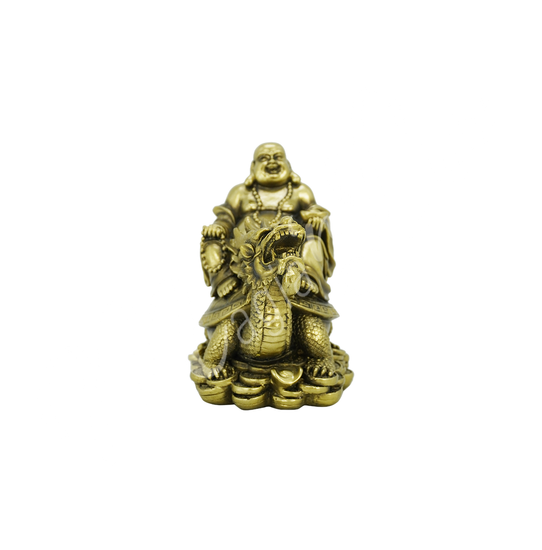A gold-colored resin statue featuring a happy Buddha seated on a turtle.