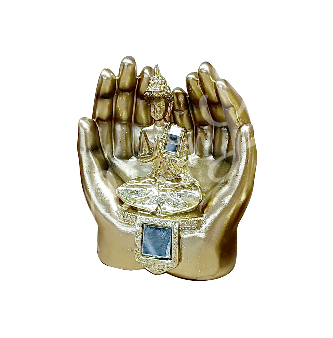 A gold-colored resin statue featuring a seated Buddha in meditation on hands.