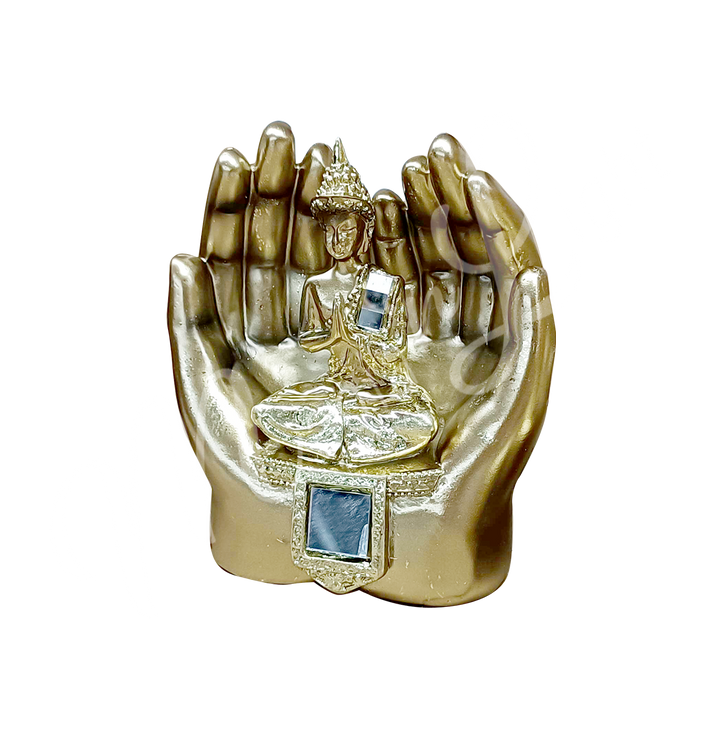 A gold-colored resin statue featuring a seated Buddha in meditation on hands.