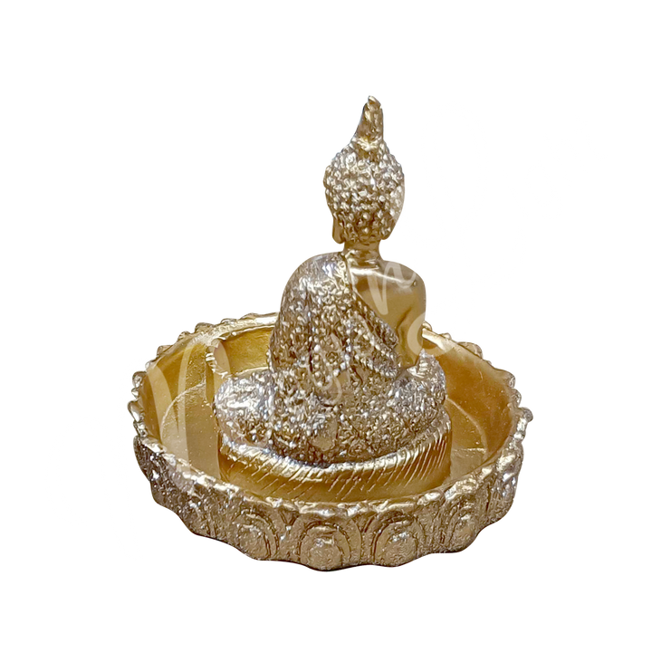 A round gold-colored tealight and incense holder made of resin, featuring a seated Buddha with tealight and incense spaces at the front. Seen from the back.