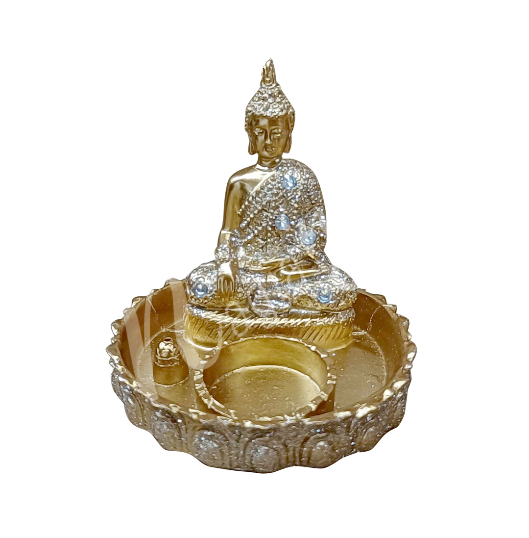 A round gold-colored tealight and incense holder made of resin, featuring a seated Buddha with tealight and incense spaces at the front.