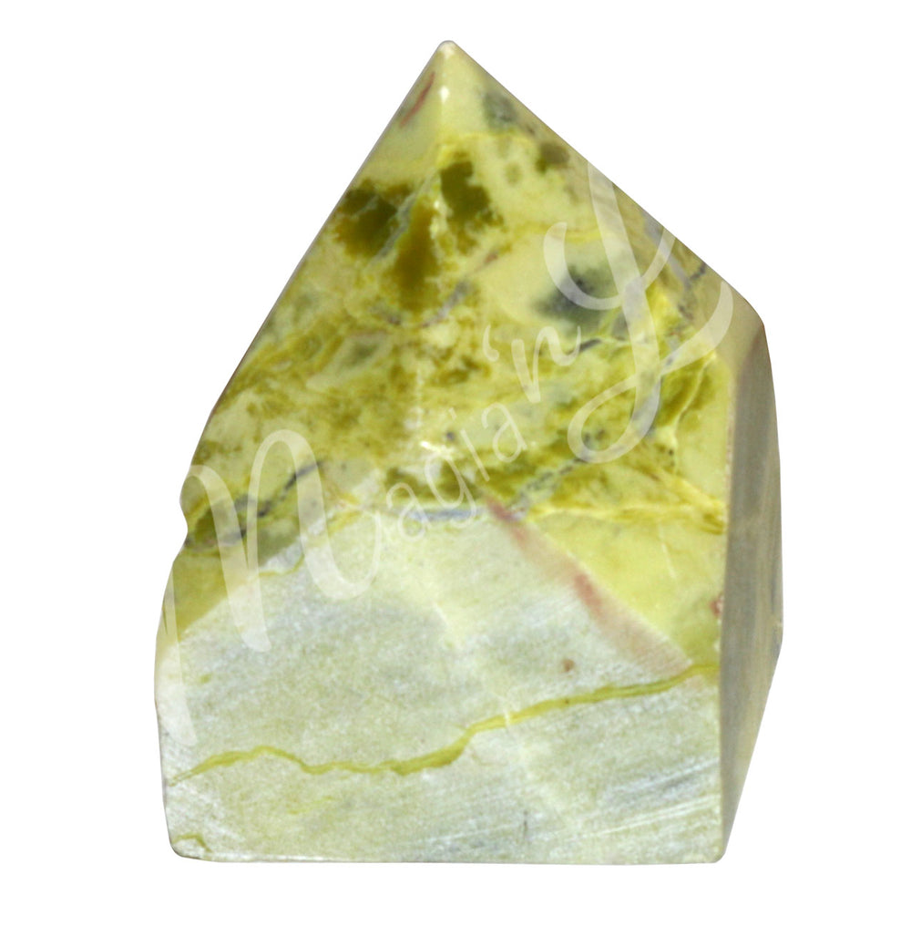 A piece of yellow and white stone. The top is cut to form a point.