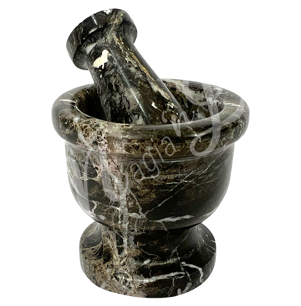 Black marble with white veining mortar and pestle set. Seen with an other angle.
