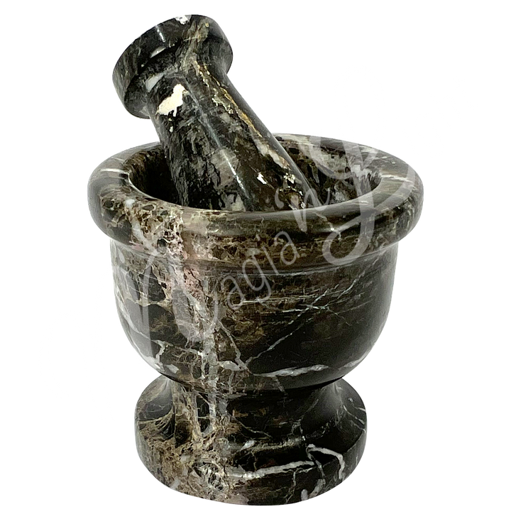 Black marble with white veining mortar and pestle set. Seen with an other angle.