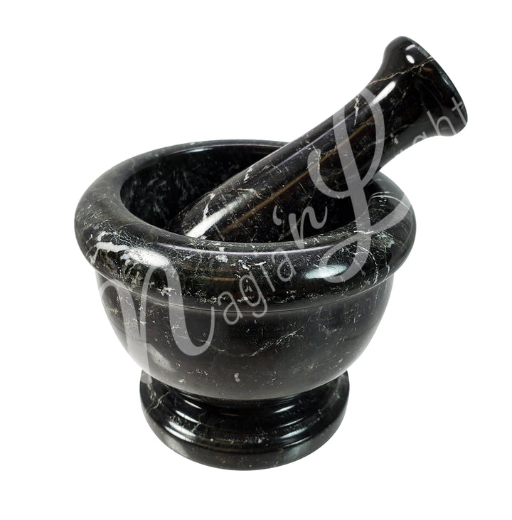 Black zebra marble with white veining mortar and pestle set.
