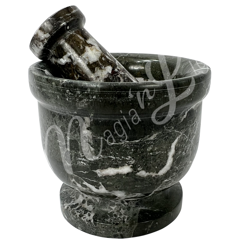 Black zebra marble with white veining mortar and pestle set. Seen in an other angle.