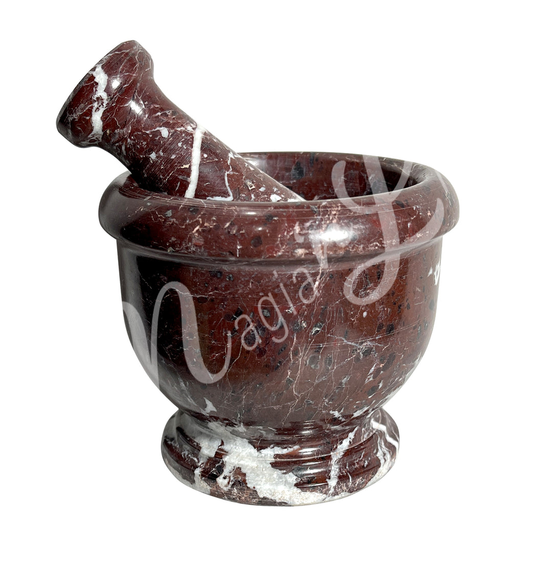 Red marble with white veining mortar and pestle set.