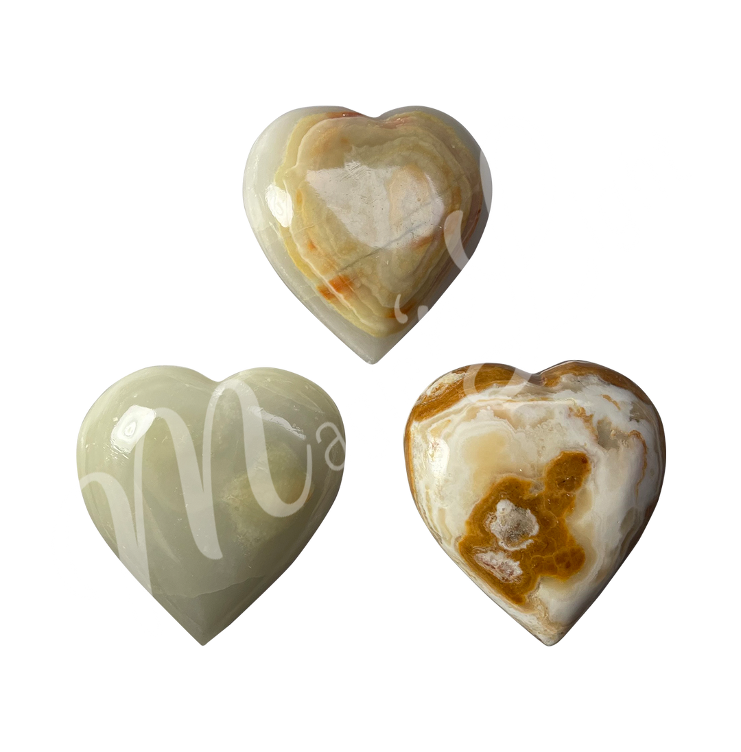 Three heart-shaped green onyx crystal.