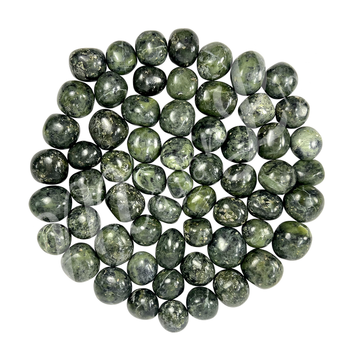 Collection of polished tumbled stones in shades of green, arranged together in a circular pile.
