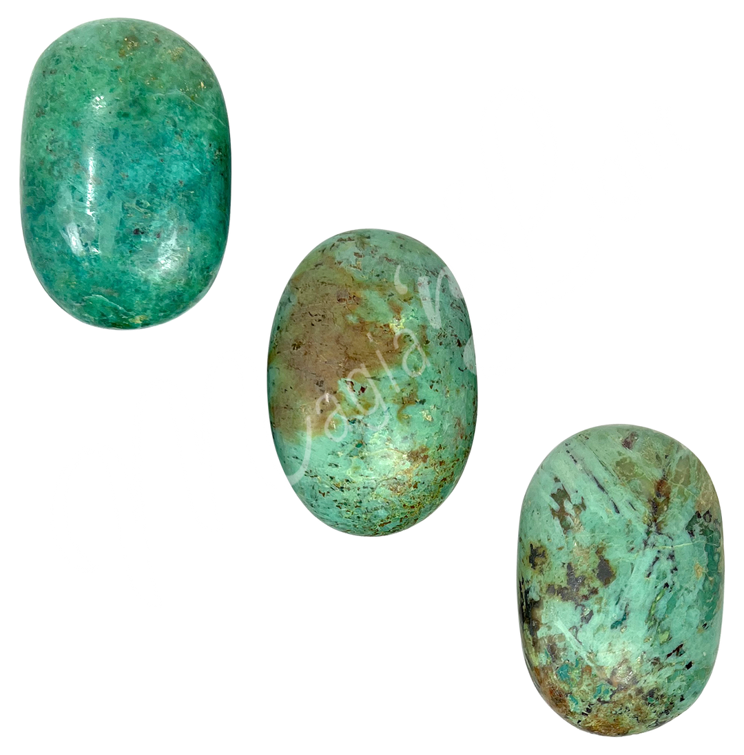 Three polished oval palm stone made of Inca Turquoise, seen with different color shade.