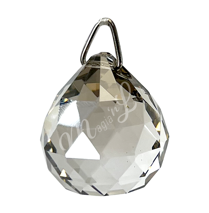 Faceted Satin crystal ball prism with a teardrop shape, reflecting light.
