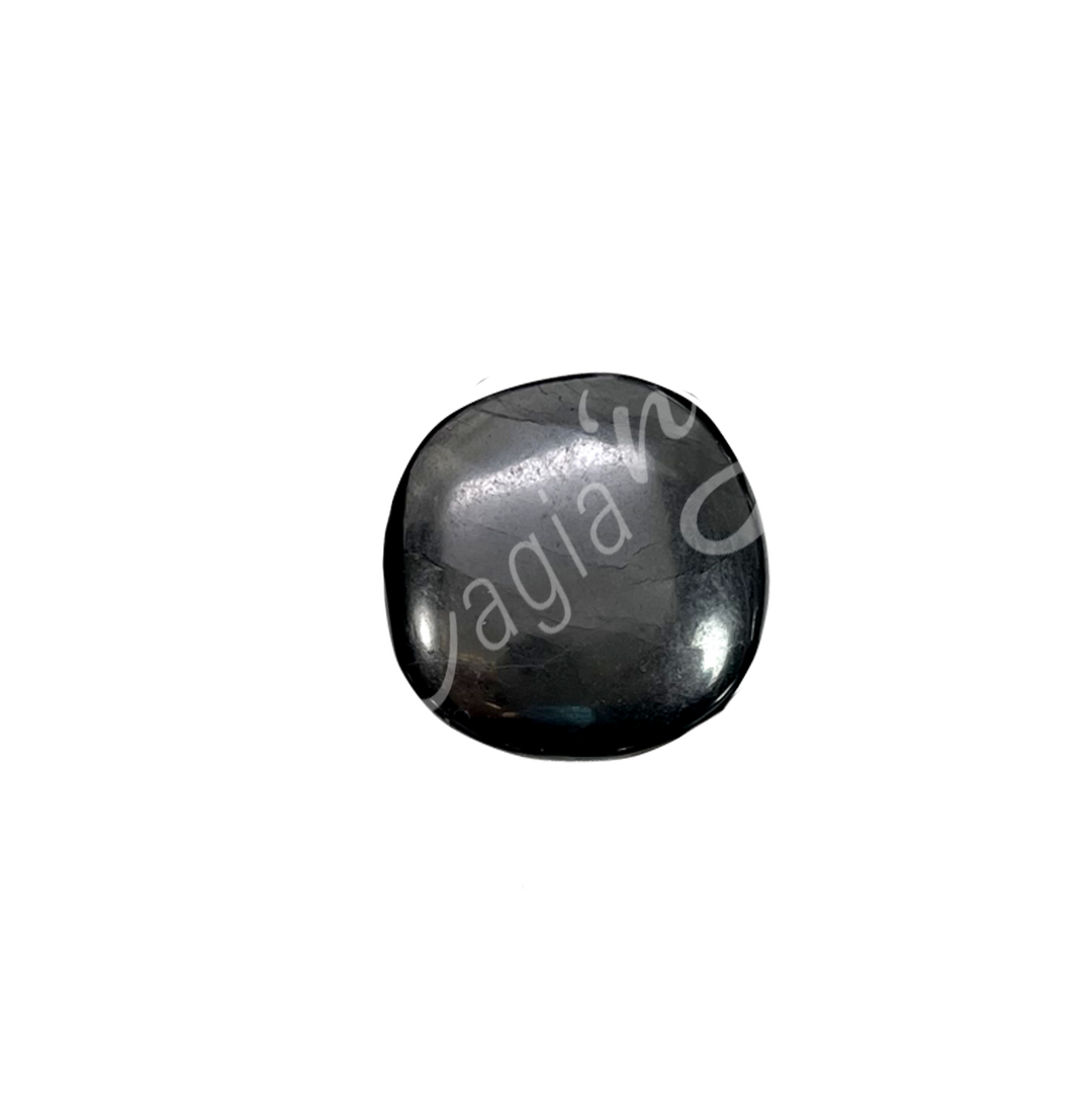 Close-up of a polished pebble made of Shungite.