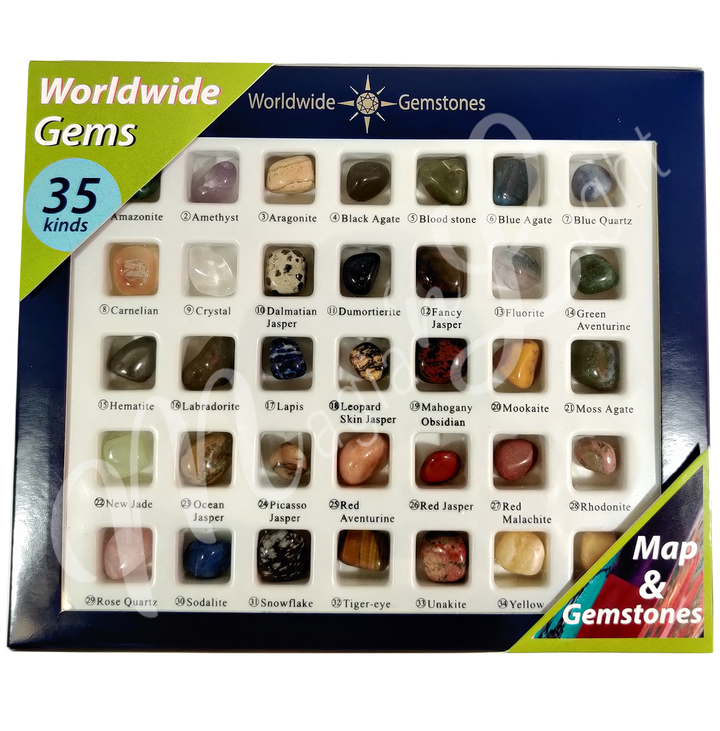 Box set labeled “Worldwide Gems” containing 35 different polished gemstones, each in its own compartment with labels.